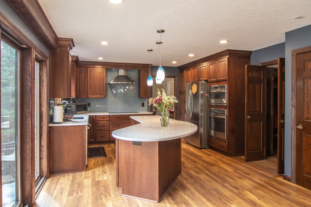 Transitional Kitchen With Uniquely Shaped Island.