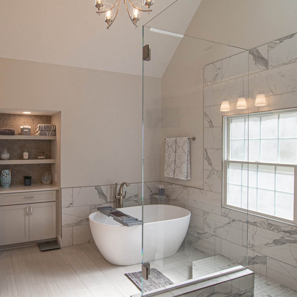 Modern take on a Coraopolis master bathroom focusing on architectural lines and custom cut clear glass walk-in shower