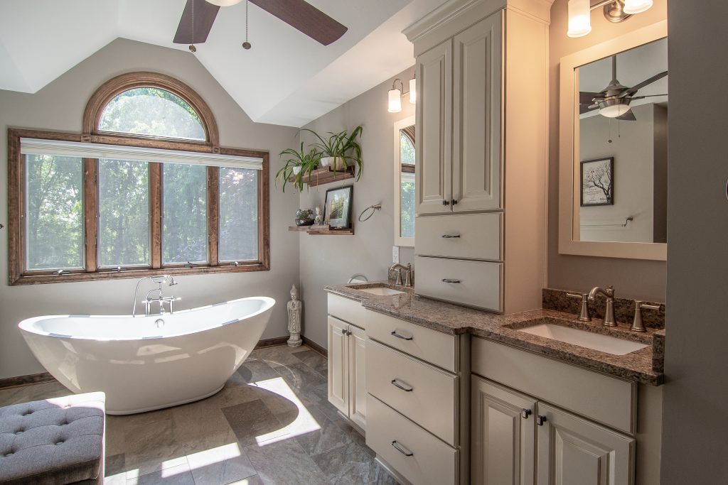 Traditional style Sewickley master bathroom with stand alone soaking tub.
