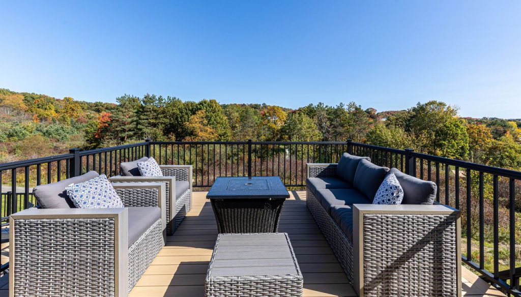 Picture of a luxurious Mt. Lebanon, PA, deck overlooking a beautiful wooded area.
