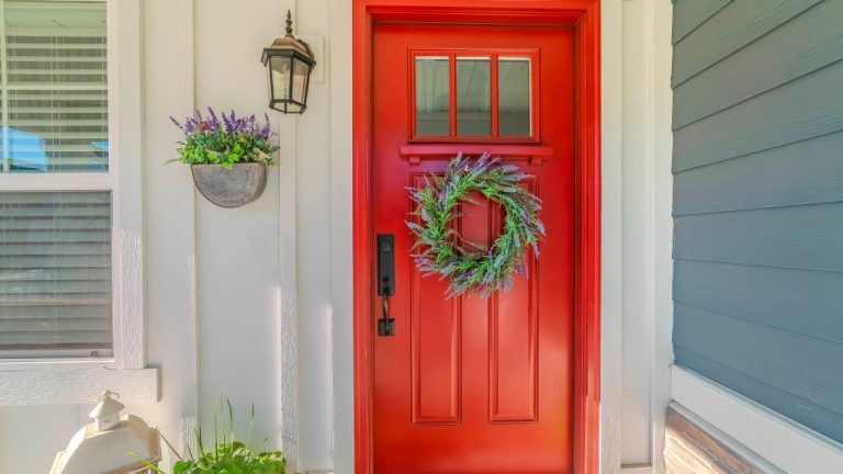 Picture of an eye-catching red front door installed in the entryway of a Monroeville, PA, home.