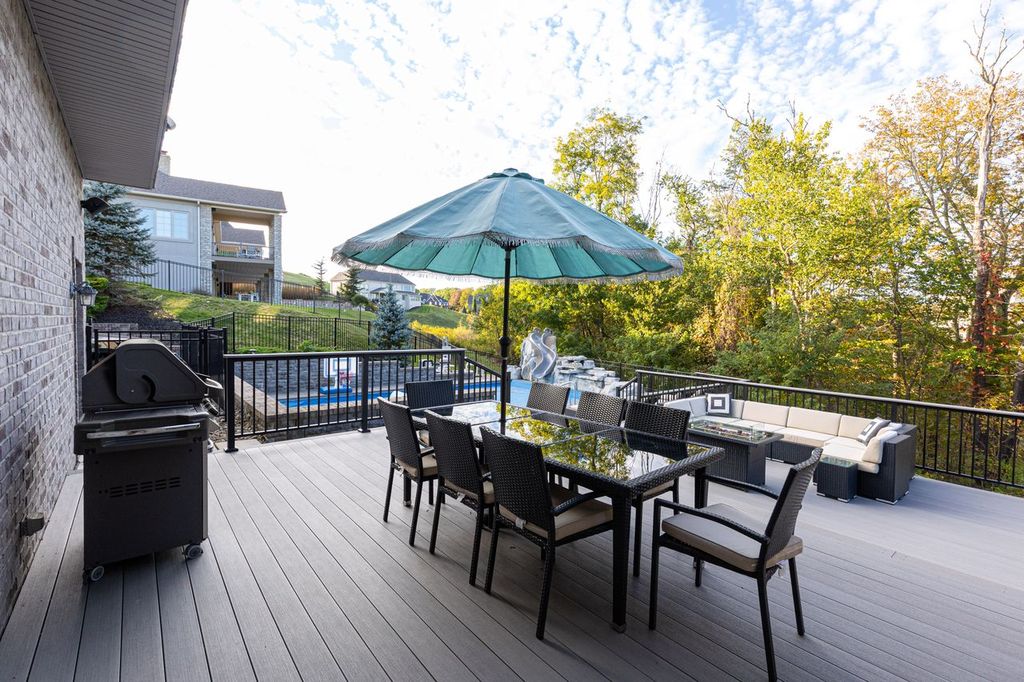 Transitional Style Modern Gibsonia Deck Looking Over a Resort-Like Backyard Perfect for Hosting and Lounging
