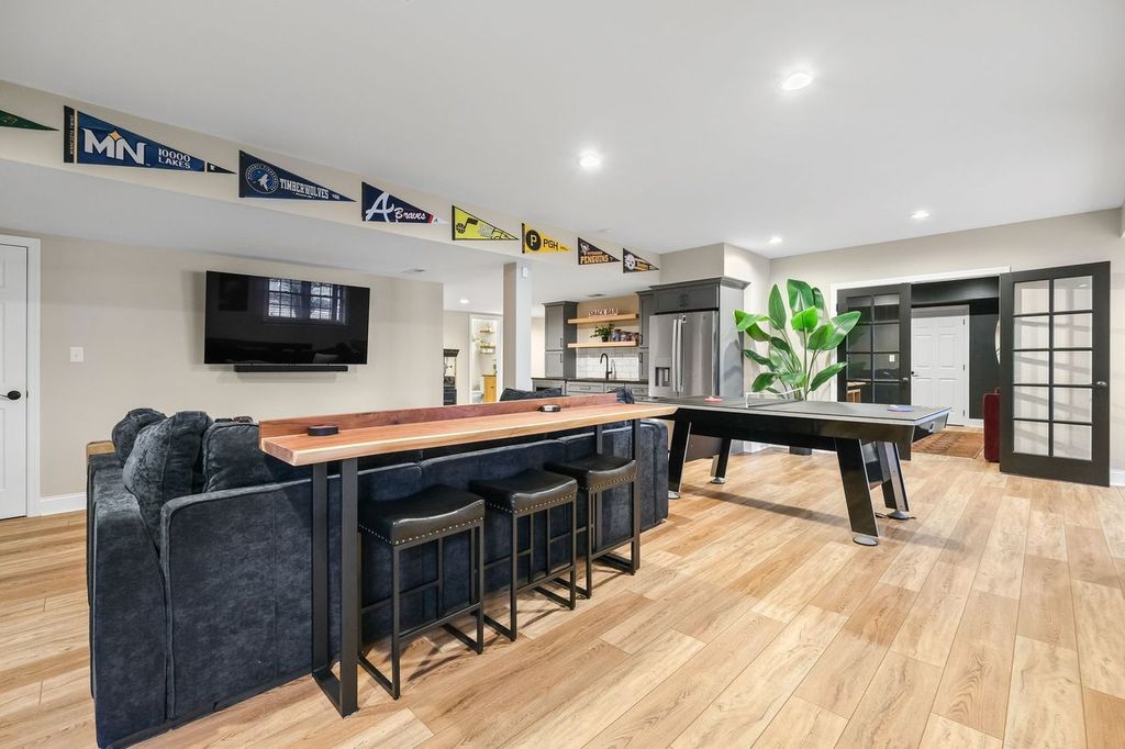 Modern McCandless Kitchenette and TV Area Create a Cozy and Inviting Spot for Socializing or Unwinding.