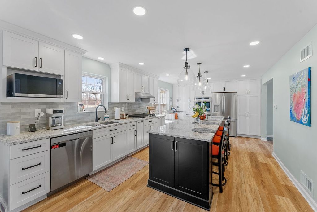 Understated and Versatile, this Wexford Kitchen has Plenty of Space for Efficient Workflow or Family Gatherings.