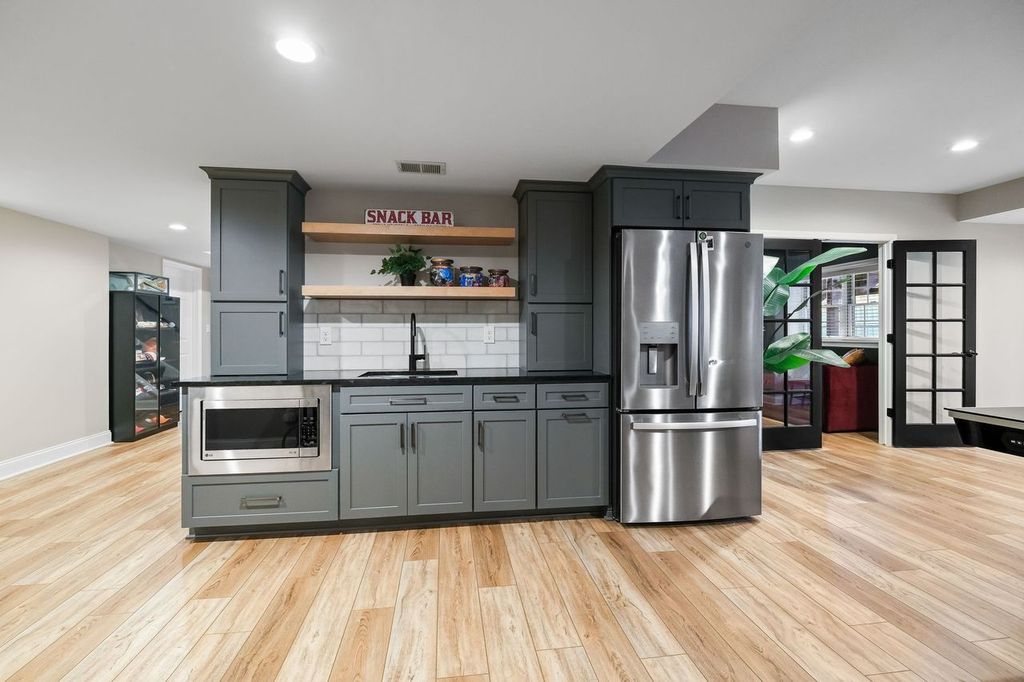 Modern Pittsburgh Kitchenette Perfect for Food Preparation and Relaxation.