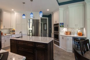 Traditional Style Ross Township Kitchen Using Shaker Doors with White Painted Finish on Island.
