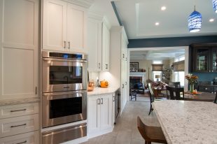 Traditional Style Ross Township Kitchen Using Shaker Doors with White Painted Finish on Island.