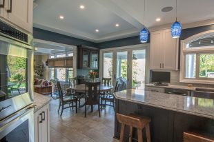 Traditional Style Ross Township Kitchen Using Shaker Doors with White Painted Finish on Island.