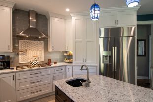 Traditional Style Ross Township Kitchen Using Shaker Doors with White Painted Finish on Island.