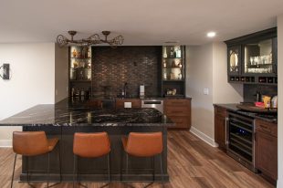 A Traditional Finished Bridgeville Basement Using Warmer Tones Throughout.