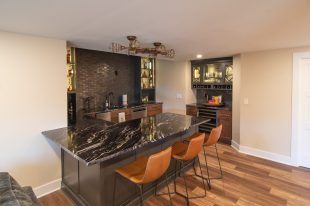 Traditional finished Murrysville Basement using Warmer Tones throughout.
