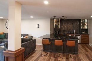 Traditional finished Murrysville Basement using Warmer Tones throughout.
