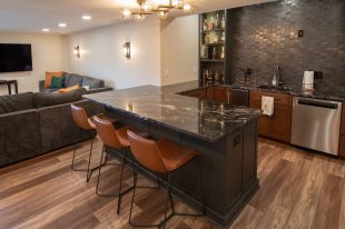 Traditional finished Murrysville Basement using Warmer Tones throughout.