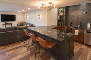 Traditional finished Murrysville Basement using Warmer Tones throughout.