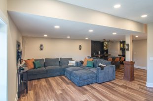 Traditional finished Murrysville Basement using Warmer Tones throughout.