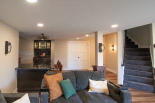 Traditional finished Murrysville Basement using Warmer Tones throughout.